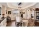 Elegant dining room with a stylish chandelier and a bright window at 16650 Shadow Wood Ct, Hudson, CO 80642