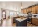 Beautiful kitchen featuring granite countertops, stainless steel appliances, and a center island at 16650 Shadow Wood Ct, Hudson, CO 80642