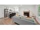 The living space features an open-concept design with a modern kitchen and comfortable seating area at 9366 Clermont Dr, Thornton, CO 80229