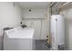 Functional laundry area features modern appliances and efficient space utilization at 3320 N Madison St, Denver, CO 80205