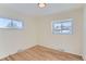 Bright bedroom with hardwood floors and large windows at 994 S Vivian Ct, Lakewood, CO 80228