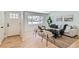 Bright living room with hardwood floors and modern furniture at 994 S Vivian Ct, Lakewood, CO 80228