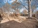 Large backyard with a mature tree and wooden fence at 3412 Zuni St, Denver, CO 80211