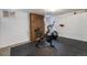 Basement gym with Peloton bike and exercise ball at 3412 Zuni St, Denver, CO 80211