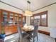 Dining area with built-in hutch and round table at 3412 Zuni St, Denver, CO 80211