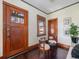 Entryway with hardwood floors and vintage wooden doors at 3412 Zuni St, Denver, CO 80211