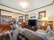 Open living room with built-in shelving and fireplace at 3412 Zuni St, Denver, CO 80211