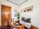 Cozy sitting area with hardwood floors and a comfy bench at 3412 Zuni St, Denver, CO 80211