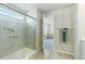 Contemporary bathroom with a glass-enclosed shower and chrome fixtures, offering modern luxury at 6150 Sugarloaf St, Brighton, CO 80601