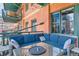 A covered and stylish balcony with ample seating for entertaining guests at 1735 19Th St # 5B, Denver, CO 80202