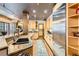 Modern kitchen featuring stainless steel appliances, ample counter space, and wooden cabinets at 1735 19Th St # 5B, Denver, CO 80202