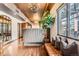 Open floor plan of elegant living room showcasing hardwood floors and abundant natural light at 1735 19Th St # 5B, Denver, CO 80202