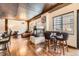 Bright living room with floor-to-ceiling windows, a fireplace and hardwood floors at 1735 19Th St # 5B, Denver, CO 80202