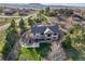Aerial view of the home showcasing its backyard, deck, landscaping and location at 501 Young Cir, Castle Rock, CO 80104