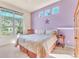 Cozy bedroom features a large window with views and modern design at 501 Young Cir, Castle Rock, CO 80104