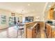Bright dining area features a bar, wood floors, and a sliding glass door to the outdoor space at 501 Young Cir, Castle Rock, CO 80104