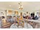 Basement living area with a bar, table, and seating around a stone fireplace at 501 Young Cir, Castle Rock, CO 80104