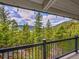 Enjoy breathtaking mountain views and lush greenery from the private balcony at 24354 Eagle Cliff Trl, Conifer, CO 80433