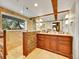 Bright bathroom features stone accents, a glass shower with a mountain view, and / sinks at 24354 Eagle Cliff Trl, Conifer, CO 80433