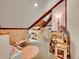 Charming bedroom with lofted bed, built-in desk, wooden beams and plush carpet, perfect for a imagination at 24354 Eagle Cliff Trl, Conifer, CO 80433