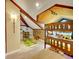 Unique bedroom design with exposed wooden beams, playful decor, and a cozy bunk bed, creating a fun and inviting space at 24354 Eagle Cliff Trl, Conifer, CO 80433