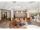 Comfortable bar area with seating for four, modern lighting, sleek counters, and stylish flooring at 100 Park W Ave # 304, Denver, CO 80205