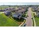 Aerial view of a residential neighborhood highlighting well-maintained lawns, mature trees, and sidewalks at 1291 Fountain Ln, Erie, CO 80516