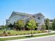 Attractive two-story home boasts a well-maintained yard, tasteful landscaping, and beautiful stone accents at 1291 Fountain Ln, Erie, CO 80516