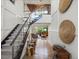 Stunning two-story foyer with hardwood floors, a modern staircase, and elegant decorative touches at 1291 Fountain Ln, Erie, CO 80516