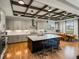 Elegant kitchen with large center island, breakfast bar, and dining table in an open layout at 1291 Fountain Ln, Erie, CO 80516