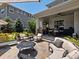 Inviting outdoor area with built in kitchen and plentiful seating, great for entertaining and enjoying the outdoors at 1291 Fountain Ln, Erie, CO 80516