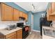 Functional kitchen with modern appliances, ample counter space, and light cabinets, perfect for cooking enthusiasts at 9886 Appletree Pl, Thornton, CO 80260