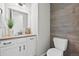 Bathroom featuring a modern vanity and commode at 3429 Goodyear St, Castle Rock, CO 80109