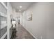 Inviting entryway featuring wood floors, neutral paint, and elegant decor at 3429 Goodyear St, Castle Rock, CO 80109