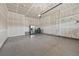 Spacious, unfinished two-car garage with a clean epoxy floor at 3429 Goodyear St, Castle Rock, CO 80109