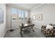 This office features a plush carpet, neutral walls, and windows with white shutters that let in plenty of natural light at 3429 Goodyear St, Castle Rock, CO 80109