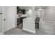 Inviting wet bar area with a wine cooler and seating, adjacent to the main room at 3429 Goodyear St, Castle Rock, CO 80109