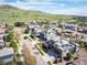 This stunning home features solar panels, a rooftop terrace, a fenced backyard, and mature landscaping at 2136 S Juniper St, Lakewood, CO 80228