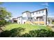 This beautiful home features a well maintained lawn, fenced yard, a private deck, and a stone patio at 2136 S Juniper St, Lakewood, CO 80228
