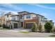 Beautiful, modern two-story home with stone accents, a two-car garage, and a well-manicured lawn at 2136 S Juniper St, Lakewood, CO 80228