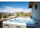 Outdoor hot tub with scenic views of the surrounding mountains and neighborhood at 2136 S Juniper St, Lakewood, CO 80228