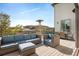Spacious outdoor patio with comfortable seating and a heater, perfect for entertaining at 2136 S Juniper St, Lakewood, CO 80228