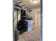 Well-equipped laundry room with shelving, front load washer and dryer, and storage at 9170 Fox Fire Dr, Highlands Ranch, CO 80129