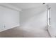 Bedroom with carpeted floors, white walls, baseboard trim, and a single window at 1901 Clear Creek Dr # F104, Georgetown, CO 80444