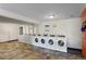 Laundry room showcasing multiple washers and dryers for resident convenience at 1901 Clear Creek Dr # F104, Georgetown, CO 80444