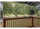 Outdoor patio provides views of a picnic table and mature trees on the property at 1901 Clear Creek Dr # F104, Georgetown, CO 80444