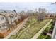 Overhead view of a quiet townhome community with walking trails and manicured landscaping at 12281 E Tennessee Dr # 302, Aurora, CO 80012