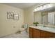 Well-lit bathroom boasts clean lines, modern fixtures, and a combined shower-tub at 12281 E Tennessee Dr # 302, Aurora, CO 80012