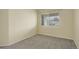 Clean empty bedroom with soft carpet and neutral paint at 12281 E Tennessee Dr # 302, Aurora, CO 80012