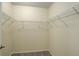 Spacious walk-in closet features plenty of shelving to keep your wardrobe organized at 12281 E Tennessee Dr # 302, Aurora, CO 80012